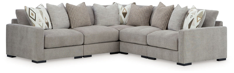 Pebble sectional sofa with grey cushions and patterned accent pillows, L-shaped