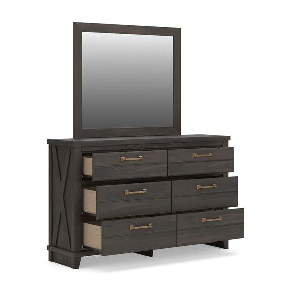 Dark brown dresser with all six drawers pulled open and matching framed mirror