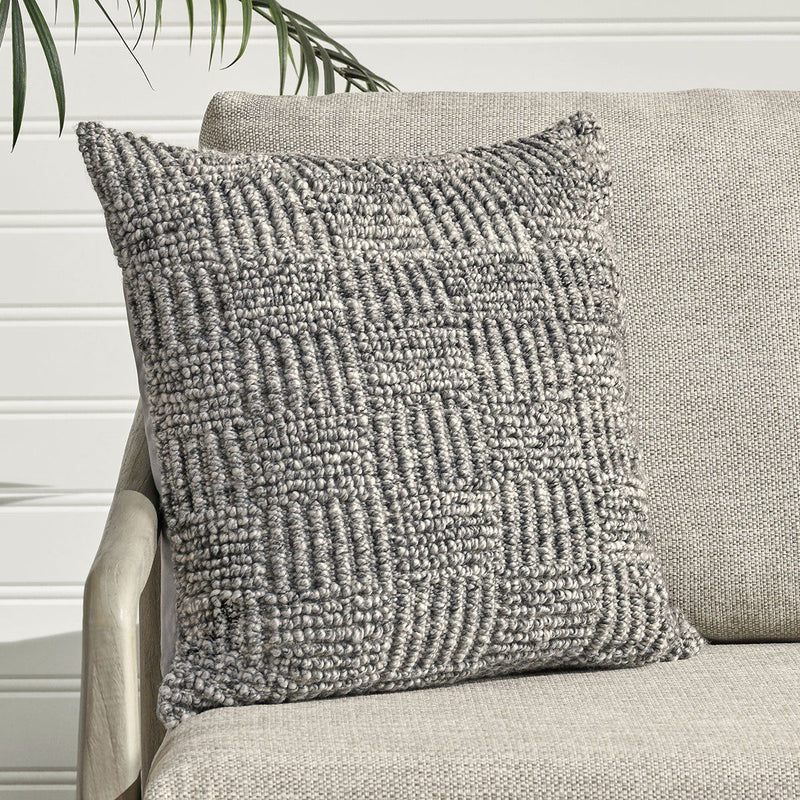 Gray square textured throw pillow with raised knit stripe pattern