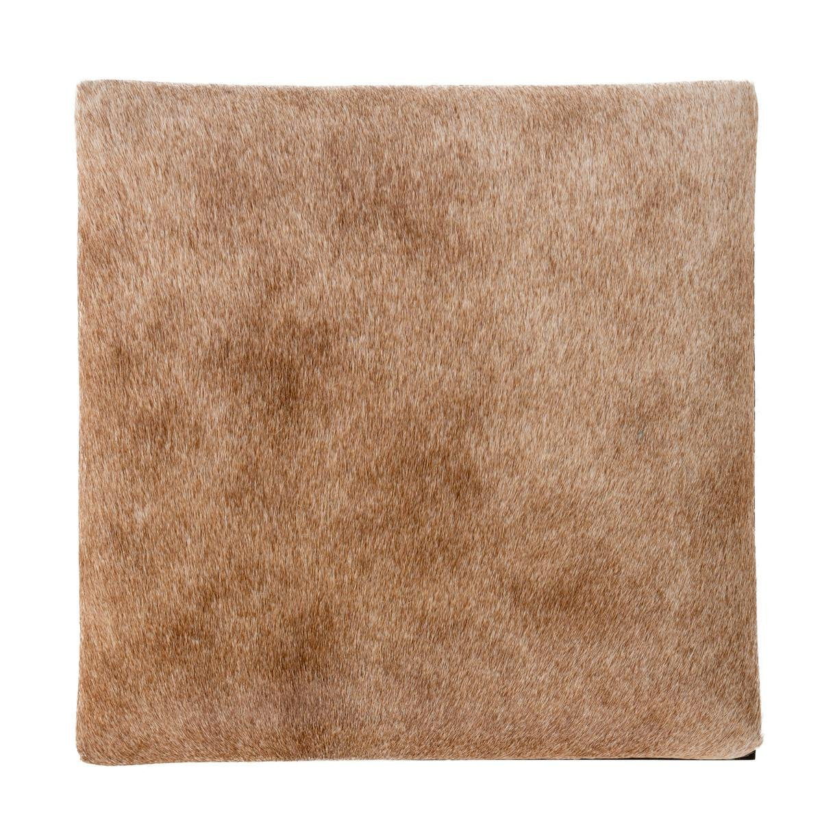 Tan upholstered seat cushion, textured fabric square