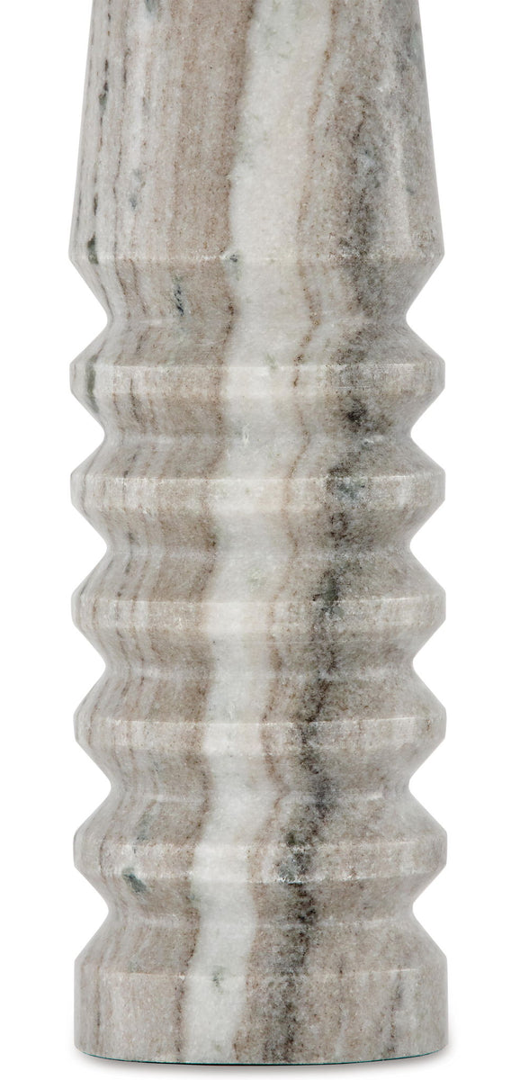 Desmont marble table lamp base close-up with gray veined stone and ridges