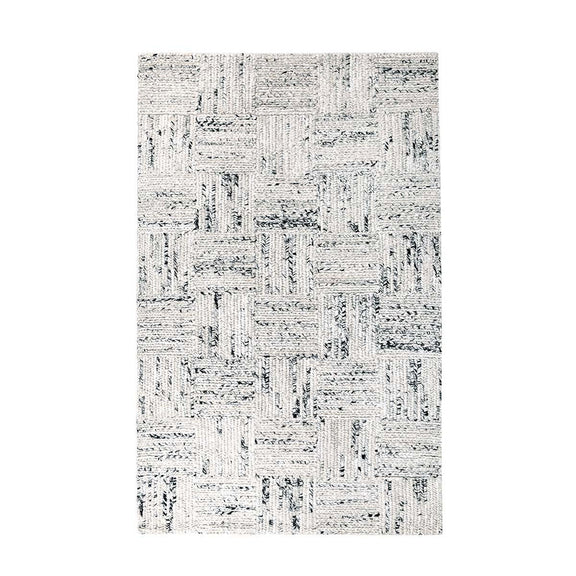 Ivory and gray distressed patterned area rug with textured, overlapping block motif