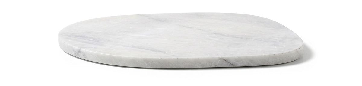 Round white marble decorative tray, angled view showing smooth rim and speckled surface