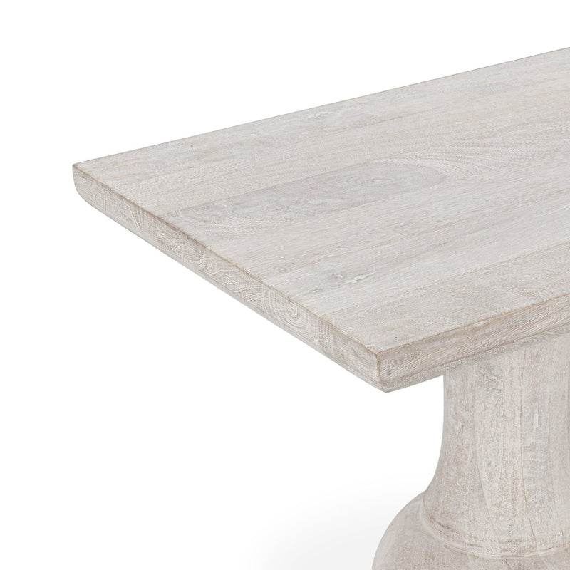 Creamwood console table close-up: distressed tabletop edge and turned pedestal base.