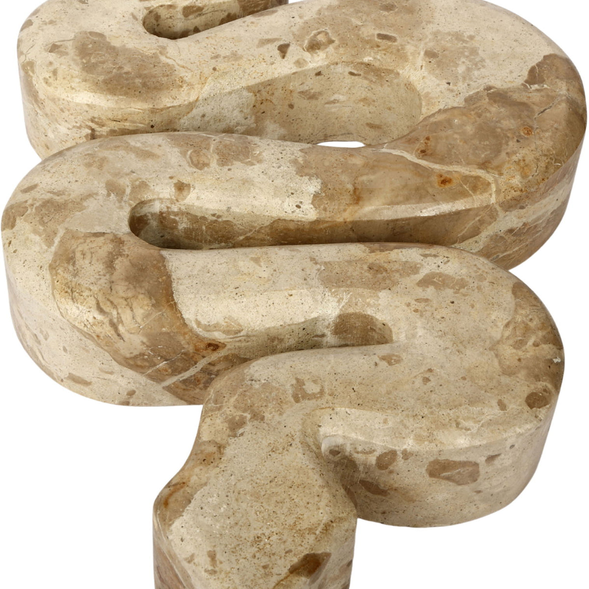 Beige marble tabletop object with open oval cutouts, close-up sculpture