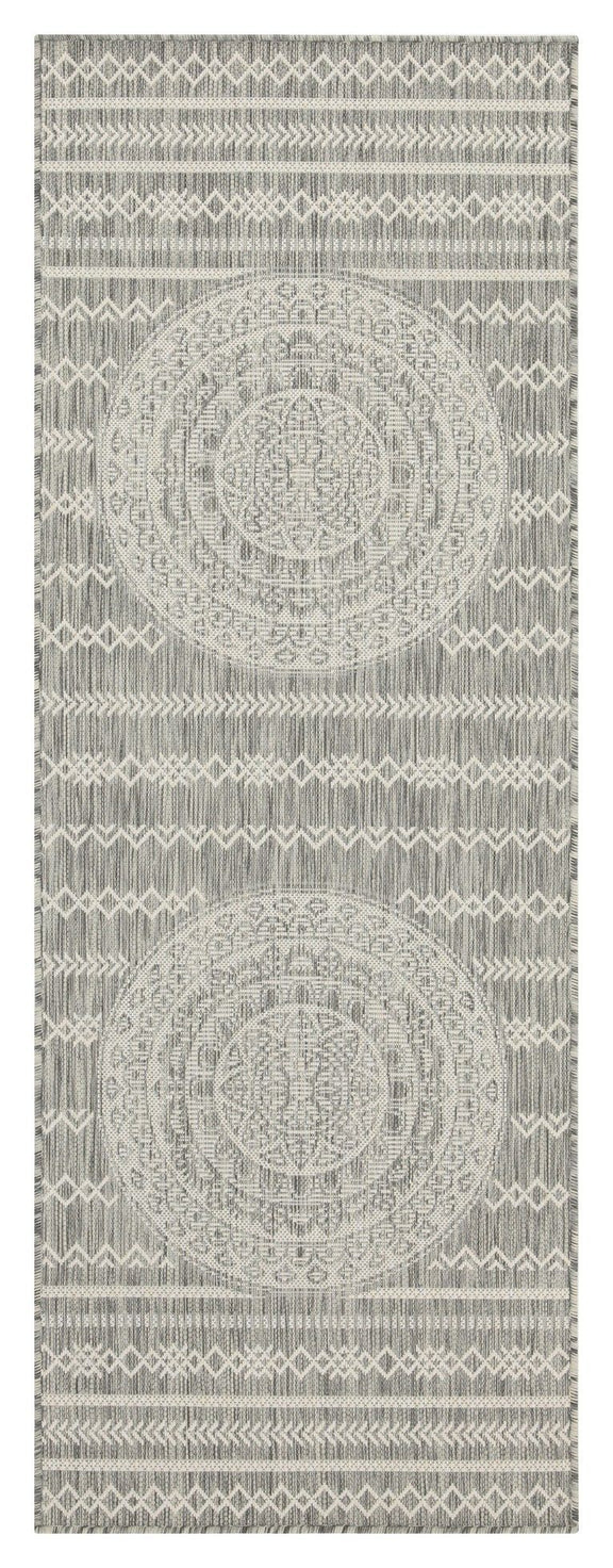 Indoor/outdoor area rug with light gray circular mandala medallions and woven stripe pattern