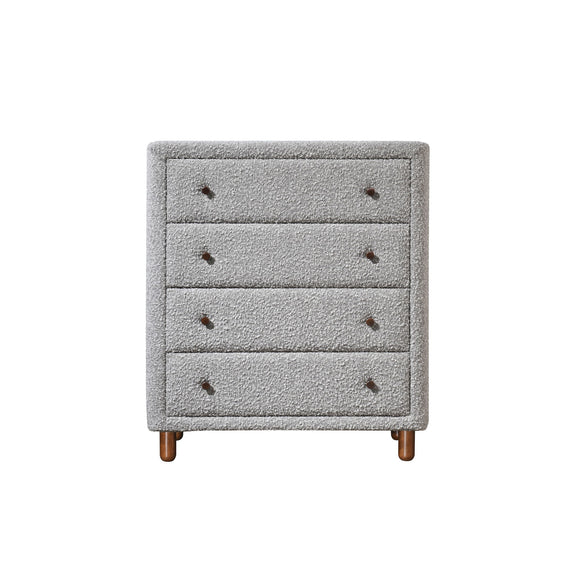 Gray upholstered chest with four drawers and dark legs