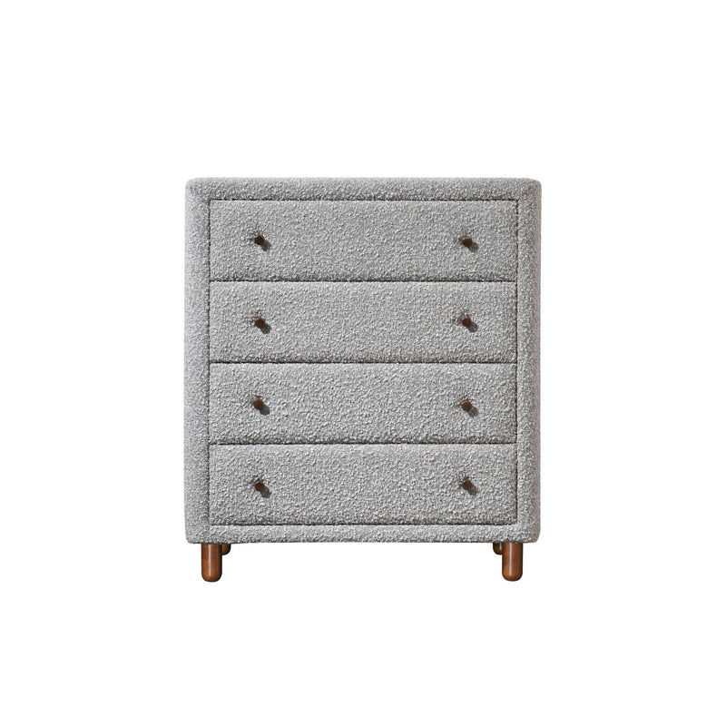 Gray upholstered chest with four drawers and dark legs