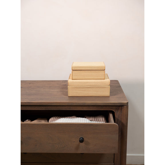 Dark brown dresser with partially open drawer, black knob, and wood top