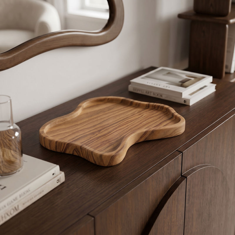 Light brown marble tray with wavy edges and striated veining, shallow serving dish