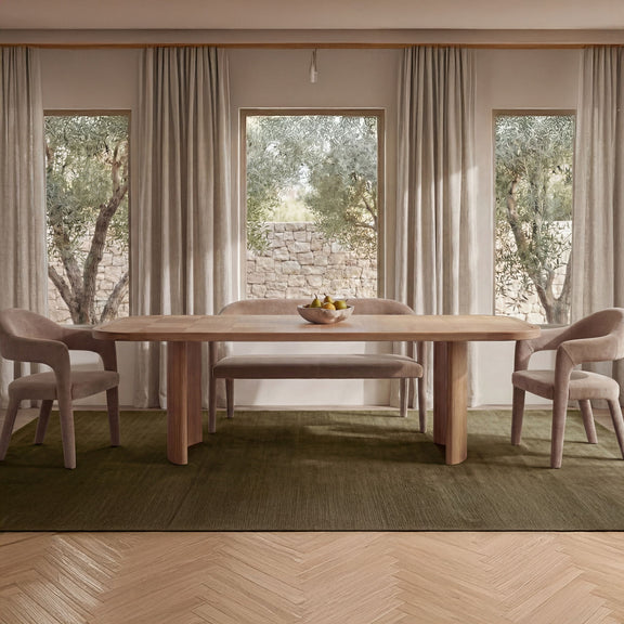 Dining bench not visible; scene shows dining table with upholstered chairs