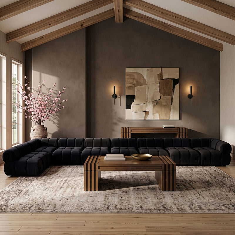 Black velvet L-shaped sectional sofa with L-shaped chaise and tufted upholstery