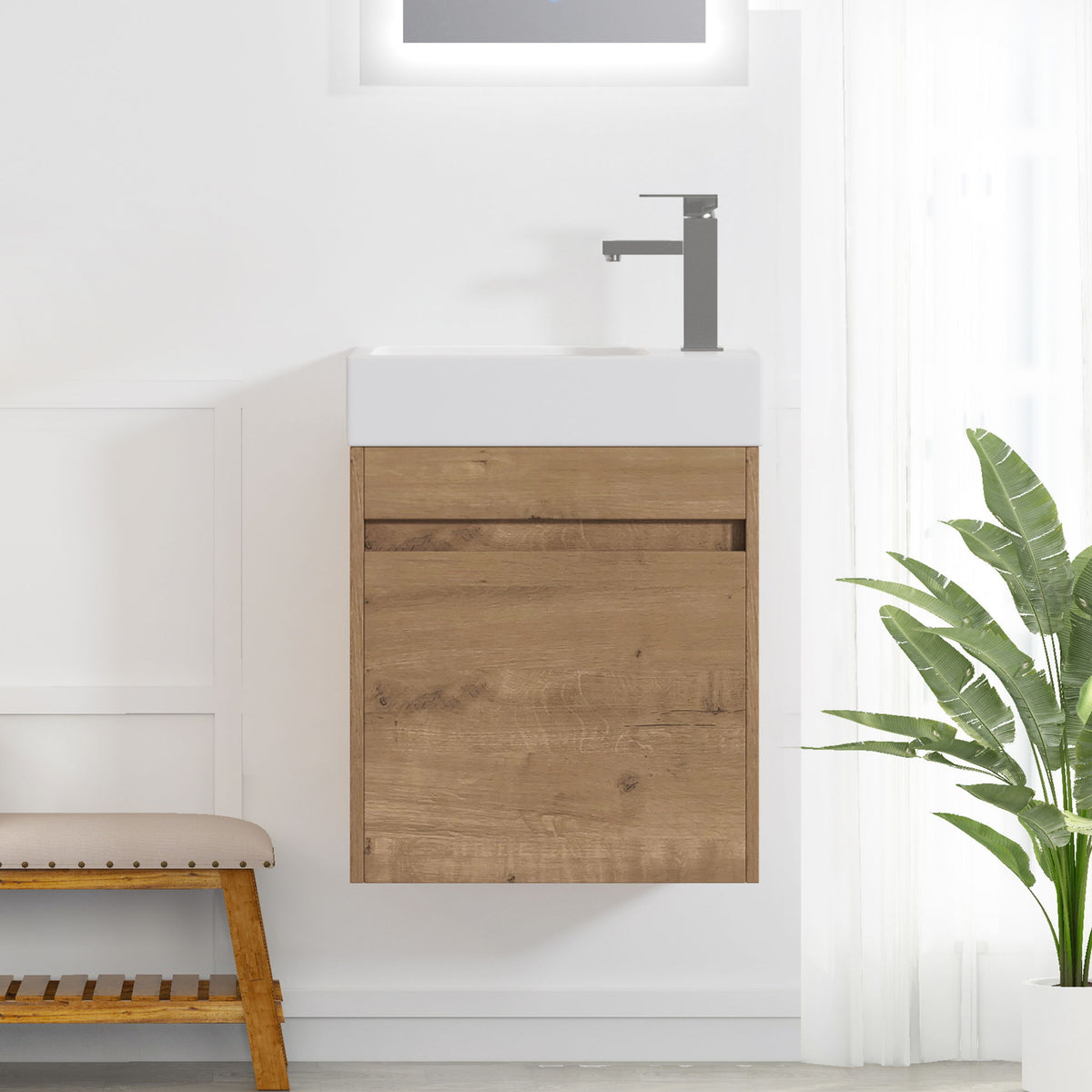 Light brown floating bathroom vanity with soft-close cabinet door and built-in sink