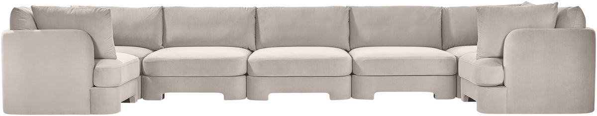 Light beige U-shaped sectional sofa with padded arms and back cushions