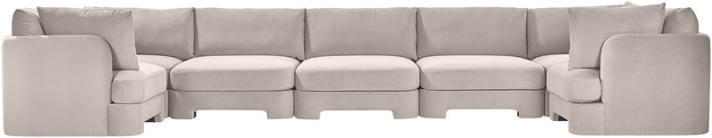 Light beige U-shaped sectional sofa with padded arms and back cushions