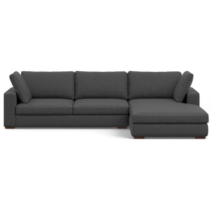 Dark gray upholstered sectional sofa with right chaise extension and deep seating