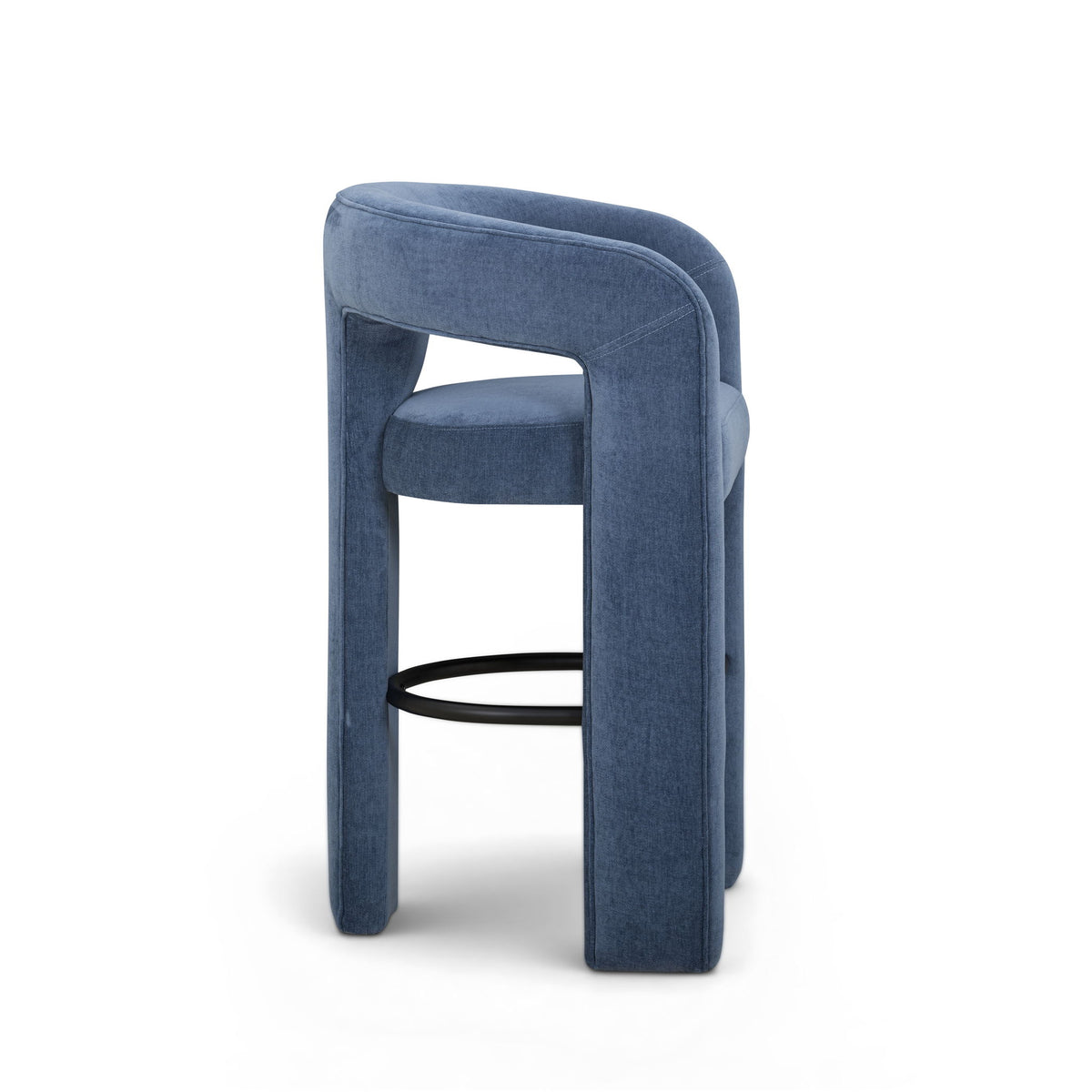 Upholstered stool in blue with thick backrest, curved legs, and black footrest ring