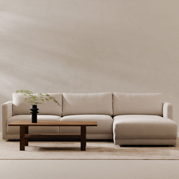 Light oyster sectional with right chaise, padded seats and back cushions, wide armrests