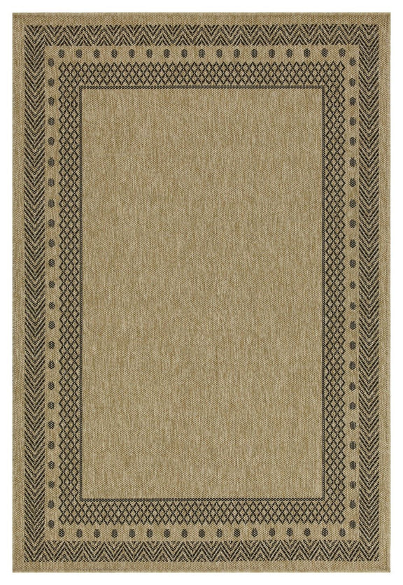 Light brown area rug featuring a dark square frame and small geometric trim.