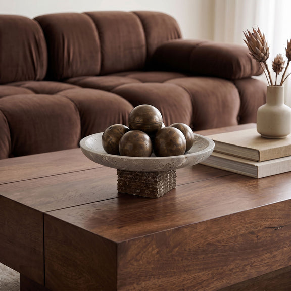 Travertine bowl on pedestal base with decorative spheres