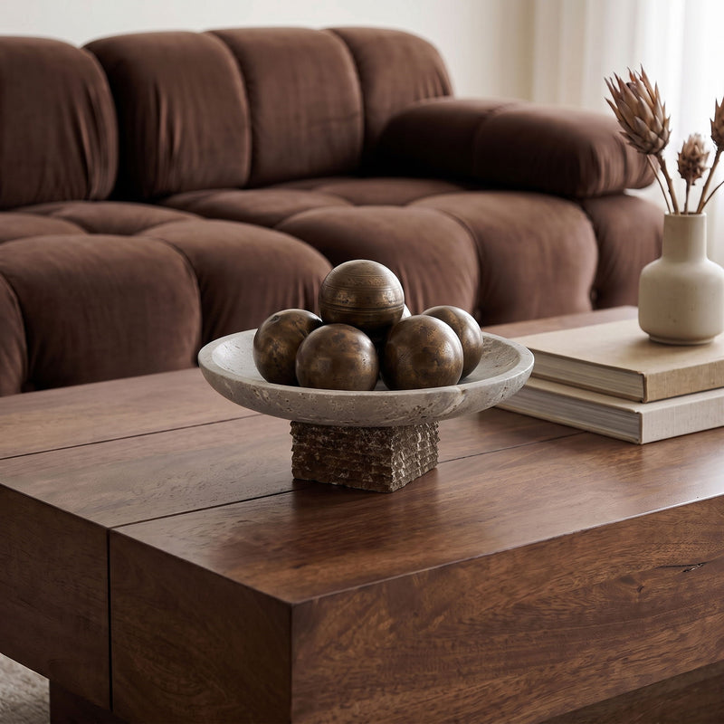 Travertine bowl on pedestal base with decorative spheres