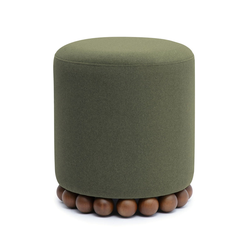Dark green cylindrical ottoman with fabric upholstery and wooden ball feet