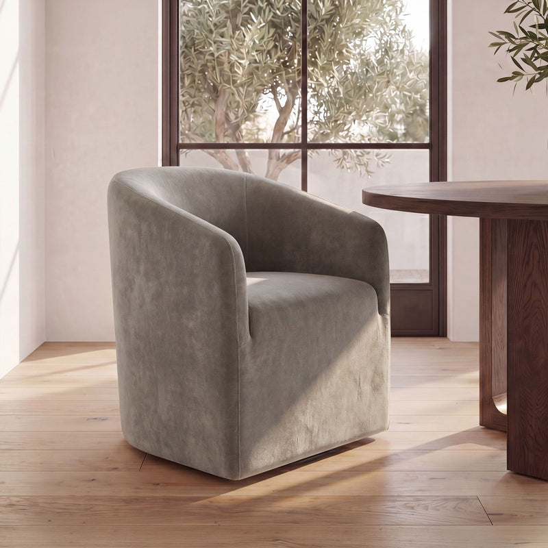 Taupe upholstered rolling dining chair with rounded arms and cushioned back