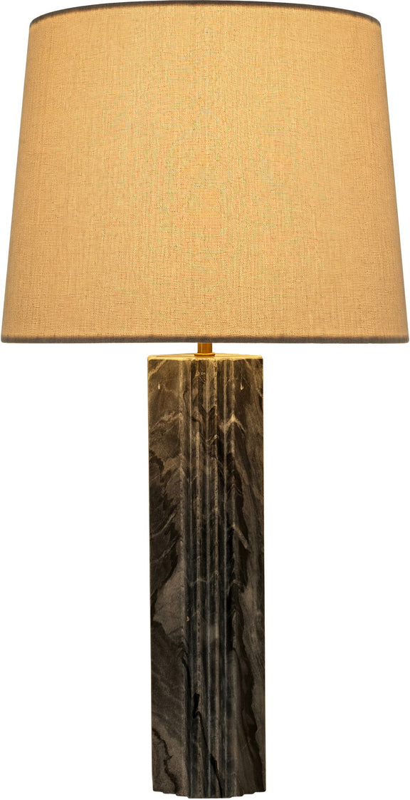 Table lamp with tan fabric shade and dark marbled stone column base