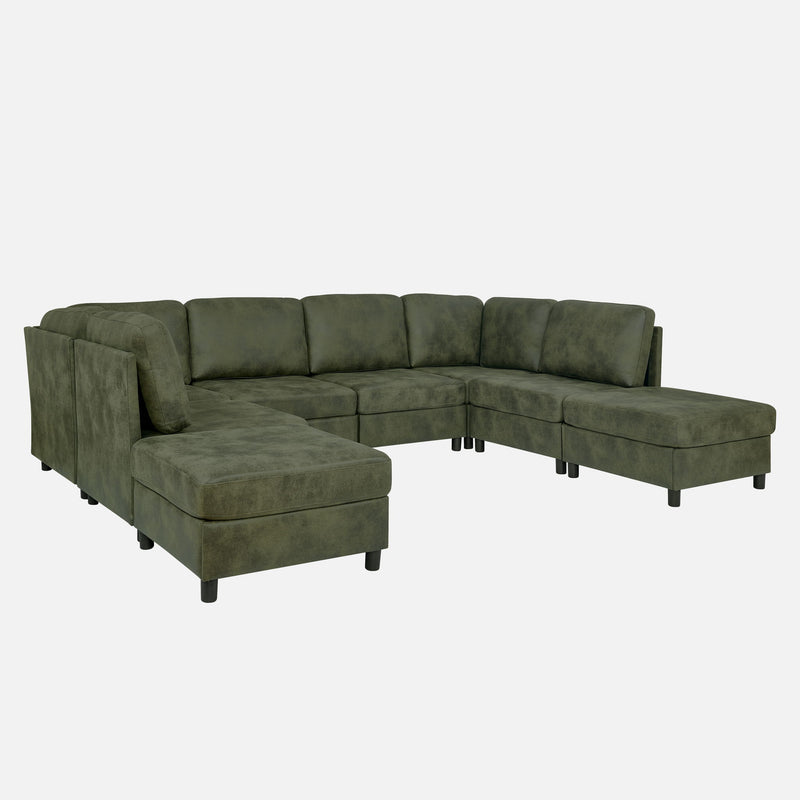 Dark green sectional sofa with removable cushions and chaise ottoman corner