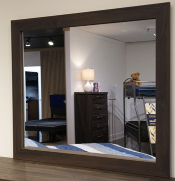 Dark brown bedroom mirror with a rectangular frame and reflective glass