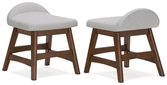 Two light gray upholstered desk chairs with curved seats, brown wooden legs and open sides