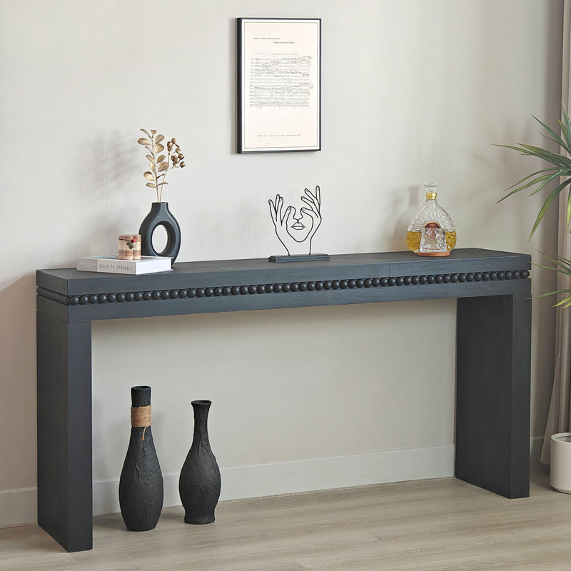 Rectangular black wood console table with beaded trim and open shelf