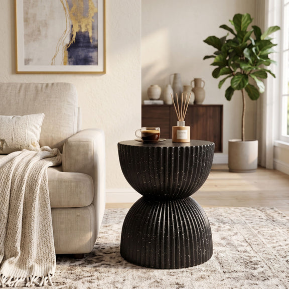 Black speckled ribbed side table with two stacked rounded forms