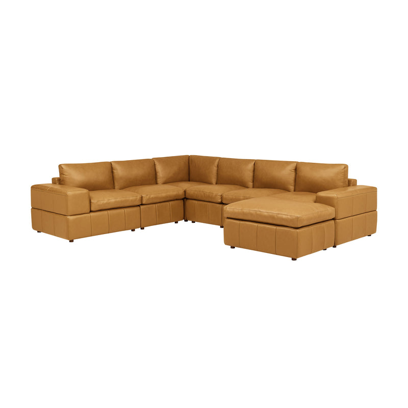 Light brown modular sectional sofa with square arms and cushioned ottoman bench