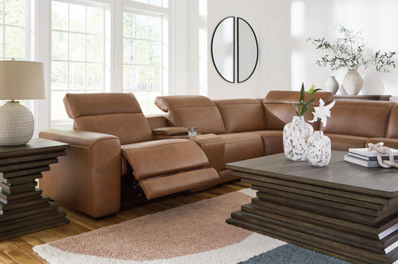 Caramel leather power reclining sectional with wide seating and multiple recliner headrests