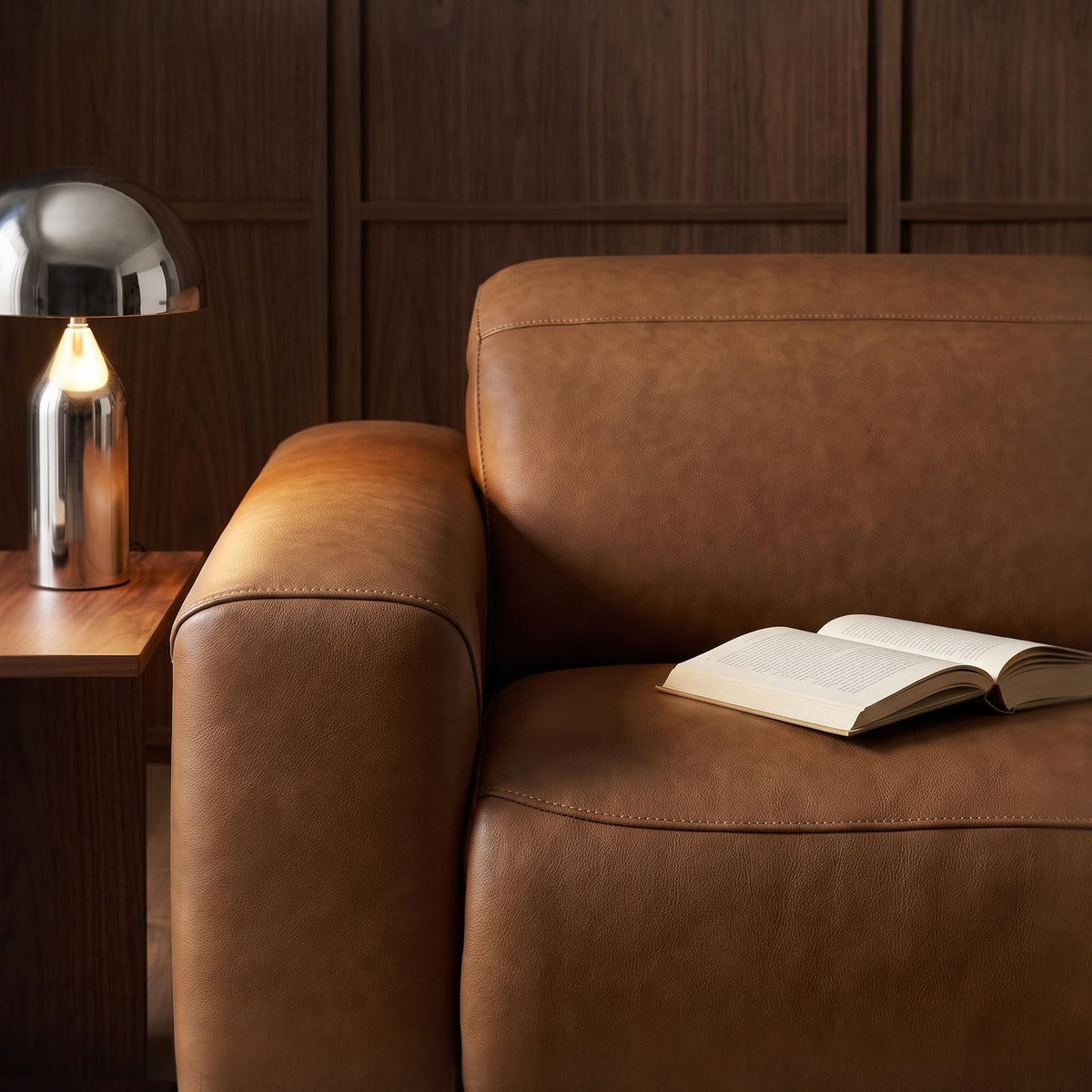 Caramel brown leather power reclining sectional sofa with padded armrests