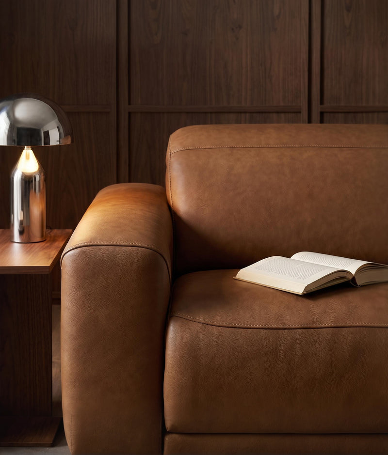 Caramel brown leather power reclining sectional sofa with padded armrests