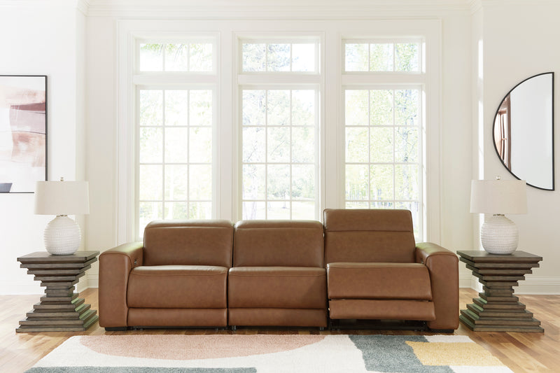 Caramel leather power reclining sectional with three seat sections and upright headrests