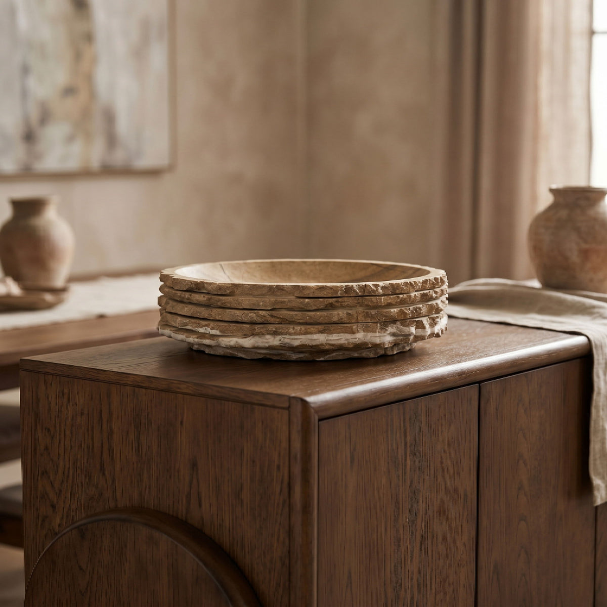 Brown marble bowl stack on wooden tabletop, round natural-veined rim