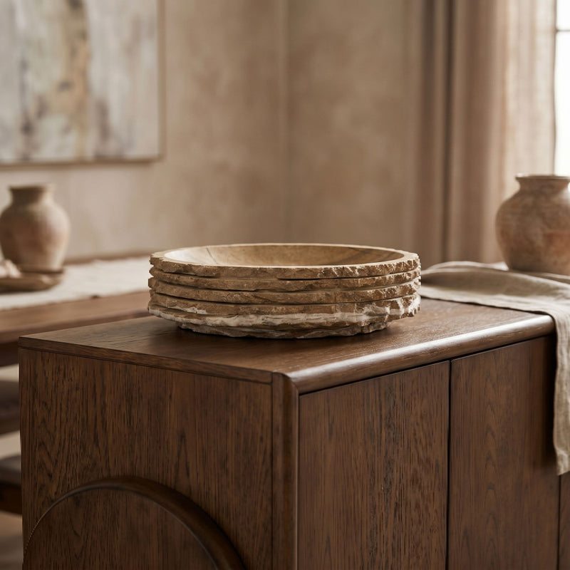 Brown marble bowl stack on wooden tabletop, round natural-veined rim