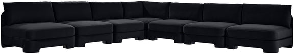7-piece armless sectional sofa in dark velvet with box cushions and built-in chaise