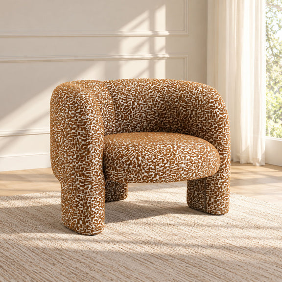 Light brown patterned Pemba accent chair with rounded arms and a cushioned seat
