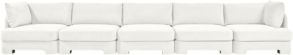White velvet upholstered sectional sofa with modular seats and back cushions