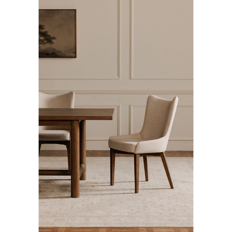Dining chair with a high curved back, beige upholstery, and dark wood legs