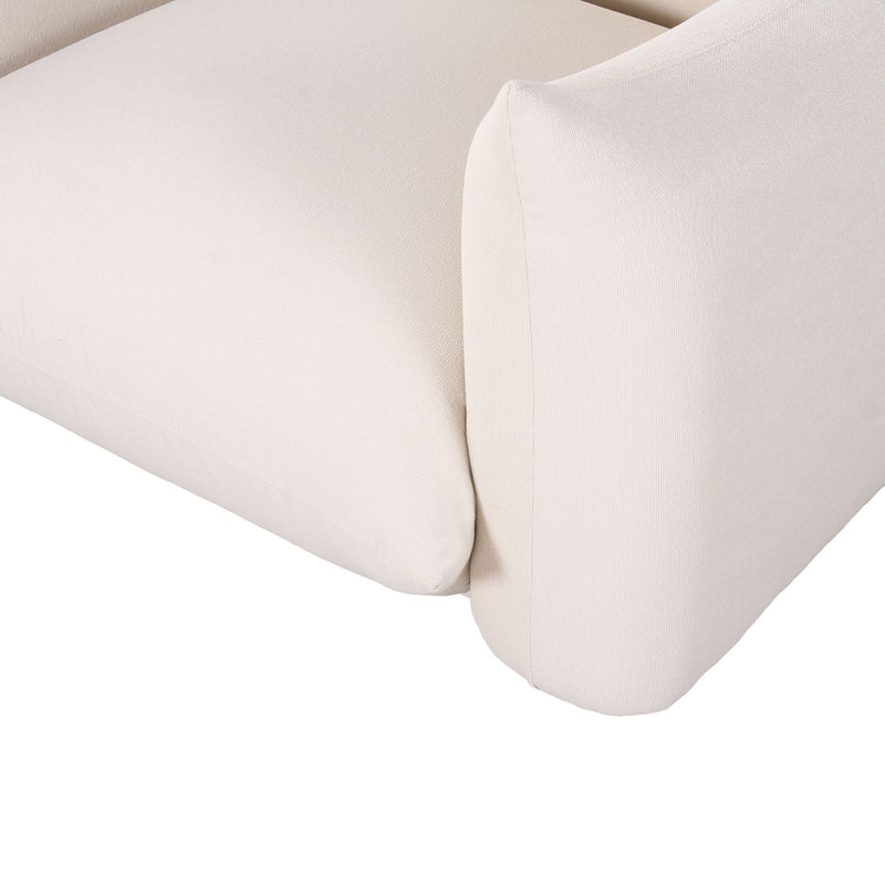 White outdoor armchair close-up of curved armrest and side cushion with upholstered seam