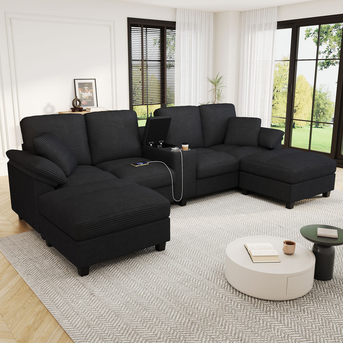 U-shaped sectional sofa with storage ottomans, black upholstery, padded armrests and cushions