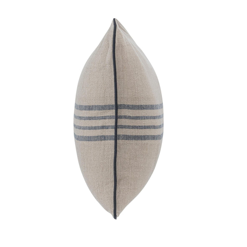 Natural linen decorative pillow with blue stripe band and dark piped edge, side view.