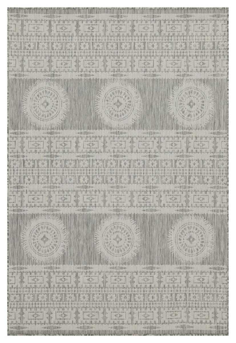 Light gray polypropylene area rug with circular medallion pattern and horizontal borders