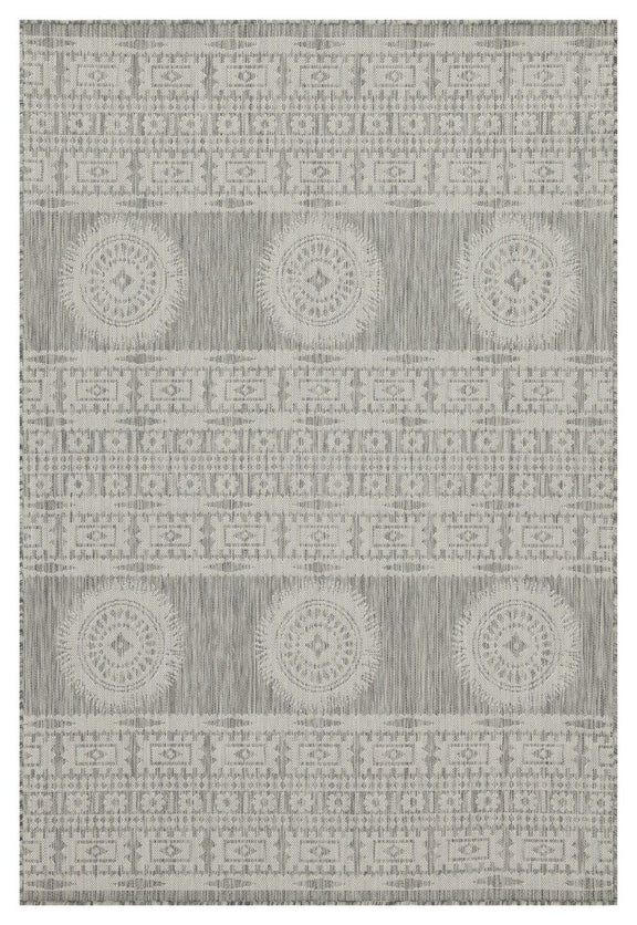 Light gray polypropylene area rug with circular medallion pattern and horizontal borders