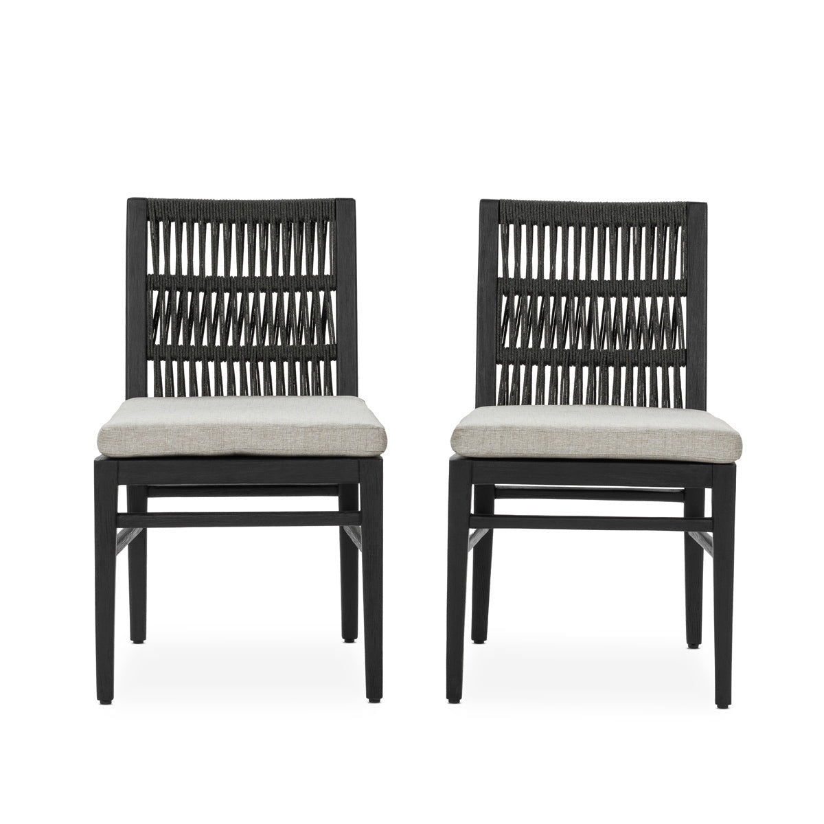 Set of 2 black outdoor dining chairs with slatted backs and beige seat cushions